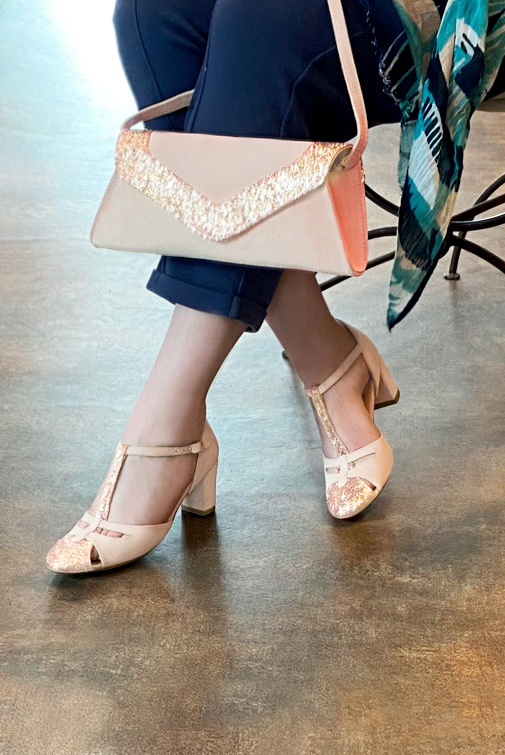 Copper gold and powder pink matching shoes and clutch. Worn view - Florence KOOIJMAN
